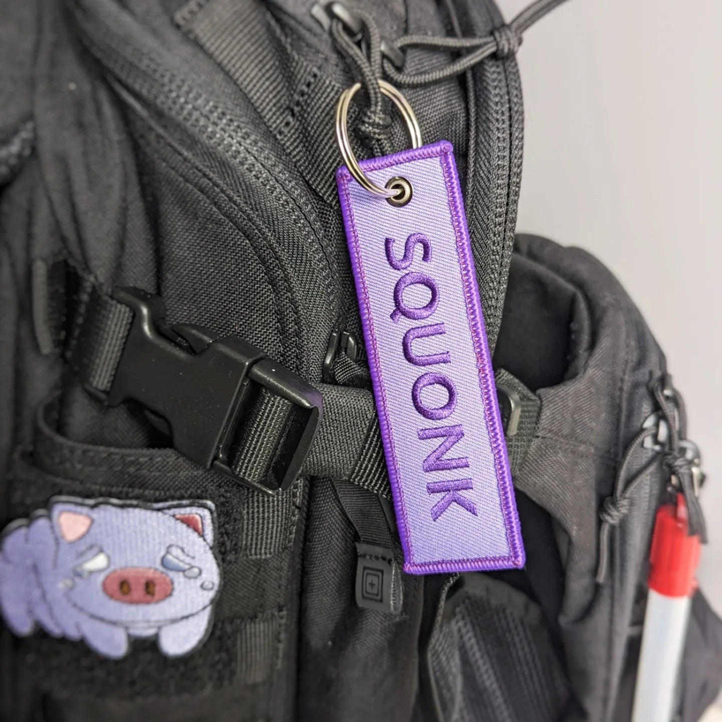 Squonk jet tag keychain